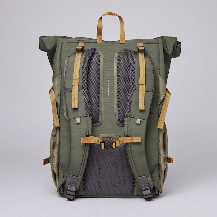 Forest Hike Trekk Green Backpack with ergonomic design and water-resistant roll-top closure.