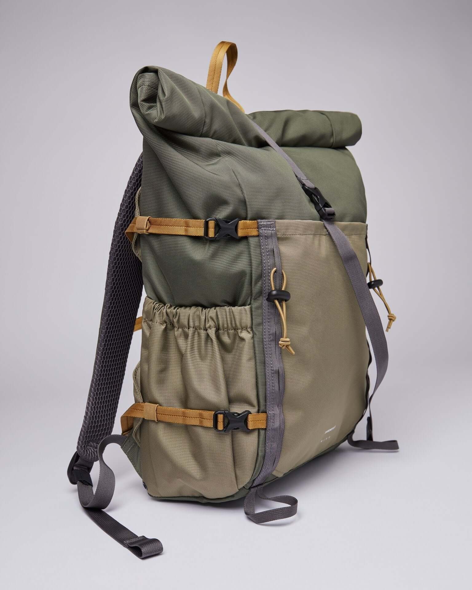 Forest Hike Trekk Green Backpack showcasing water resistant design and ergonomic features.