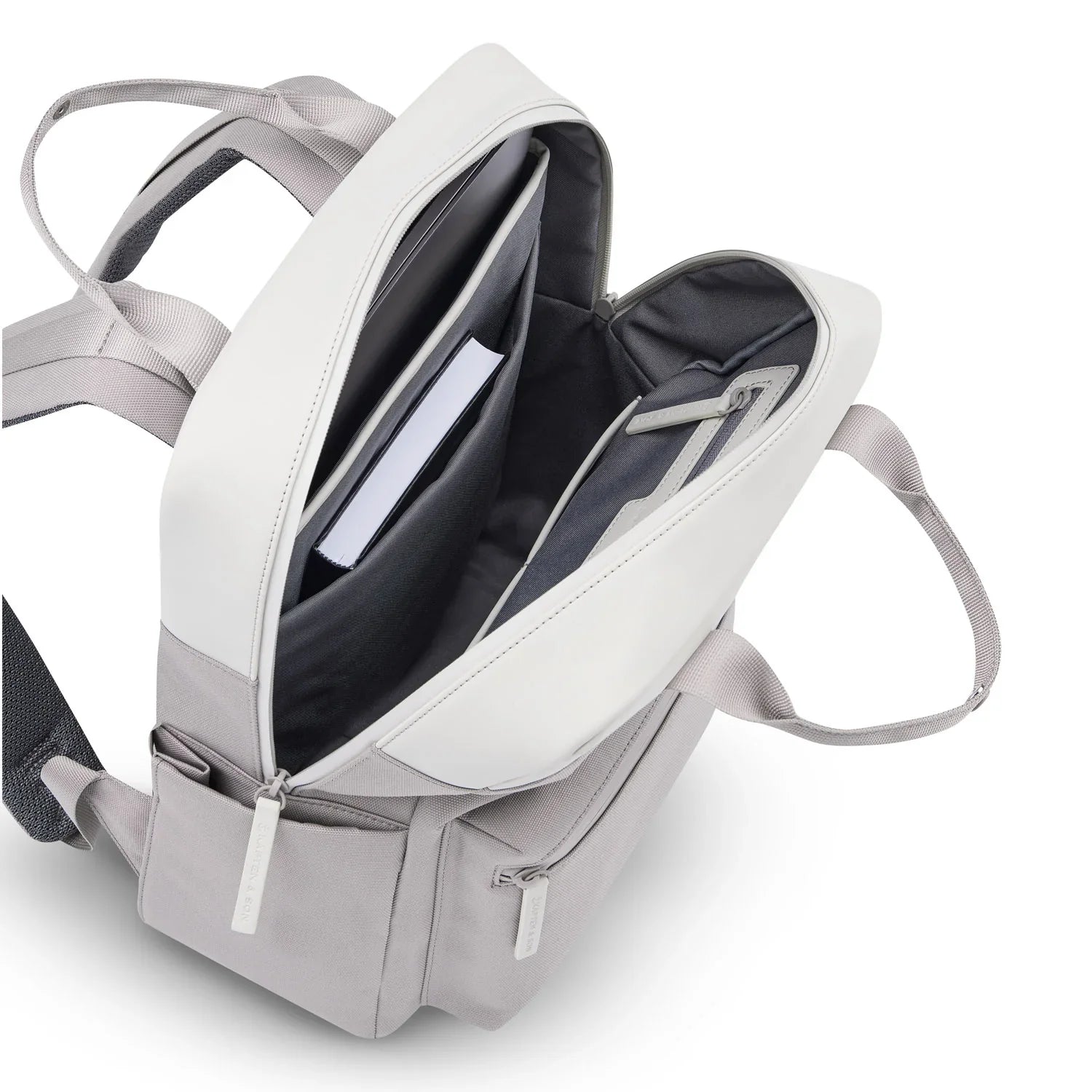 Bergen Pro Muted Clay Backpack with open compartments showcasing inner pockets and padded straps.