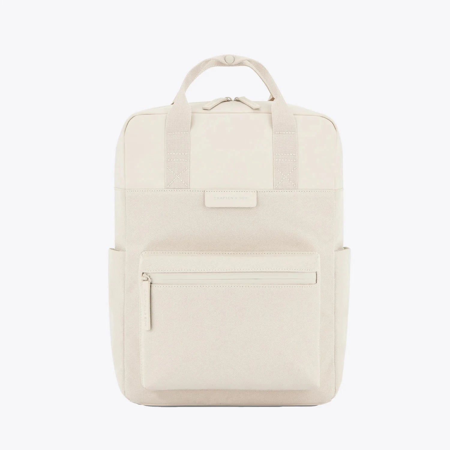 Bergen Pro Sandstone Backpack front view showing neutral color, zippered pocket, and sturdy straps.