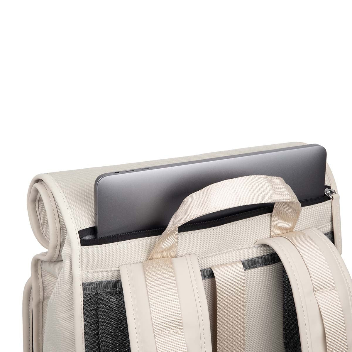 Lund Pro Sandstone Backpack with laptop partially visible, showcasing ergonomic design and roll-top access.