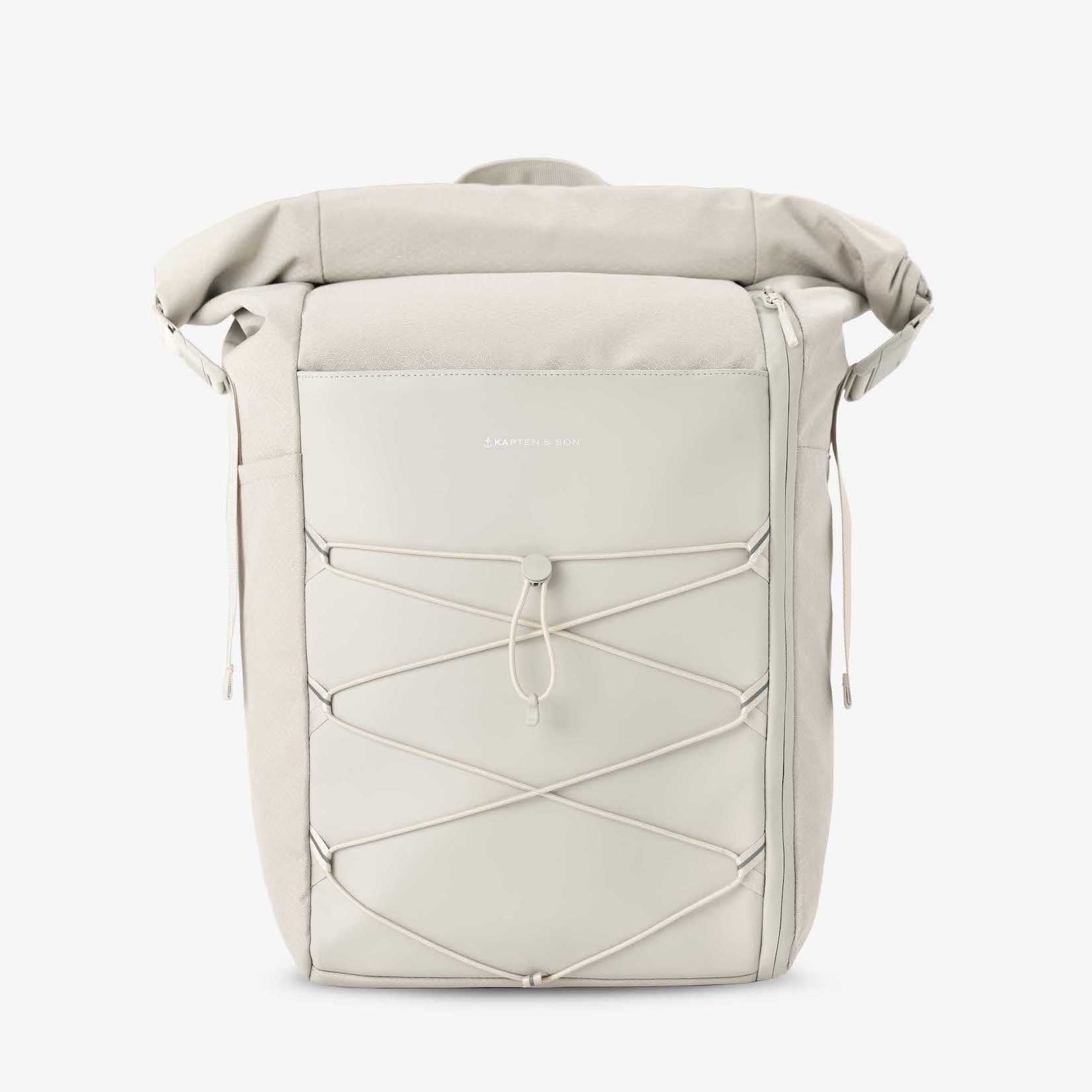 Yoho Sandstone Backpack with magnetic buckles, padded straps, and water-resistant material.