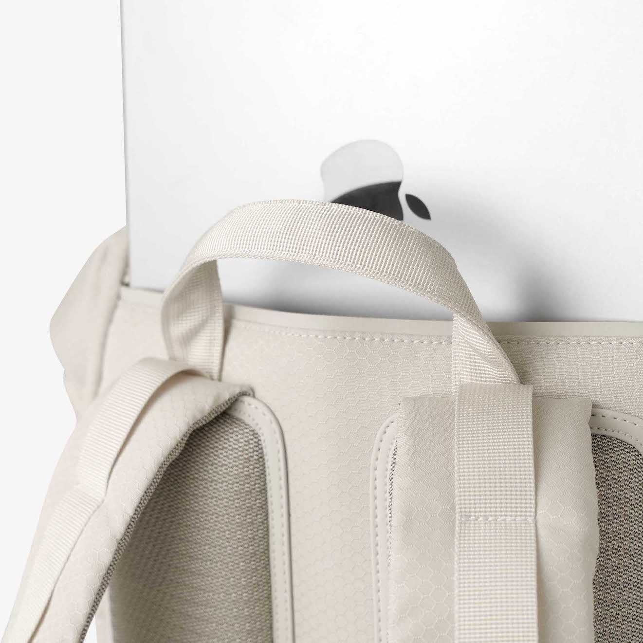 Yoho Sandstone Backpack features padded straps and back panel for comfortable carrying of laptop.