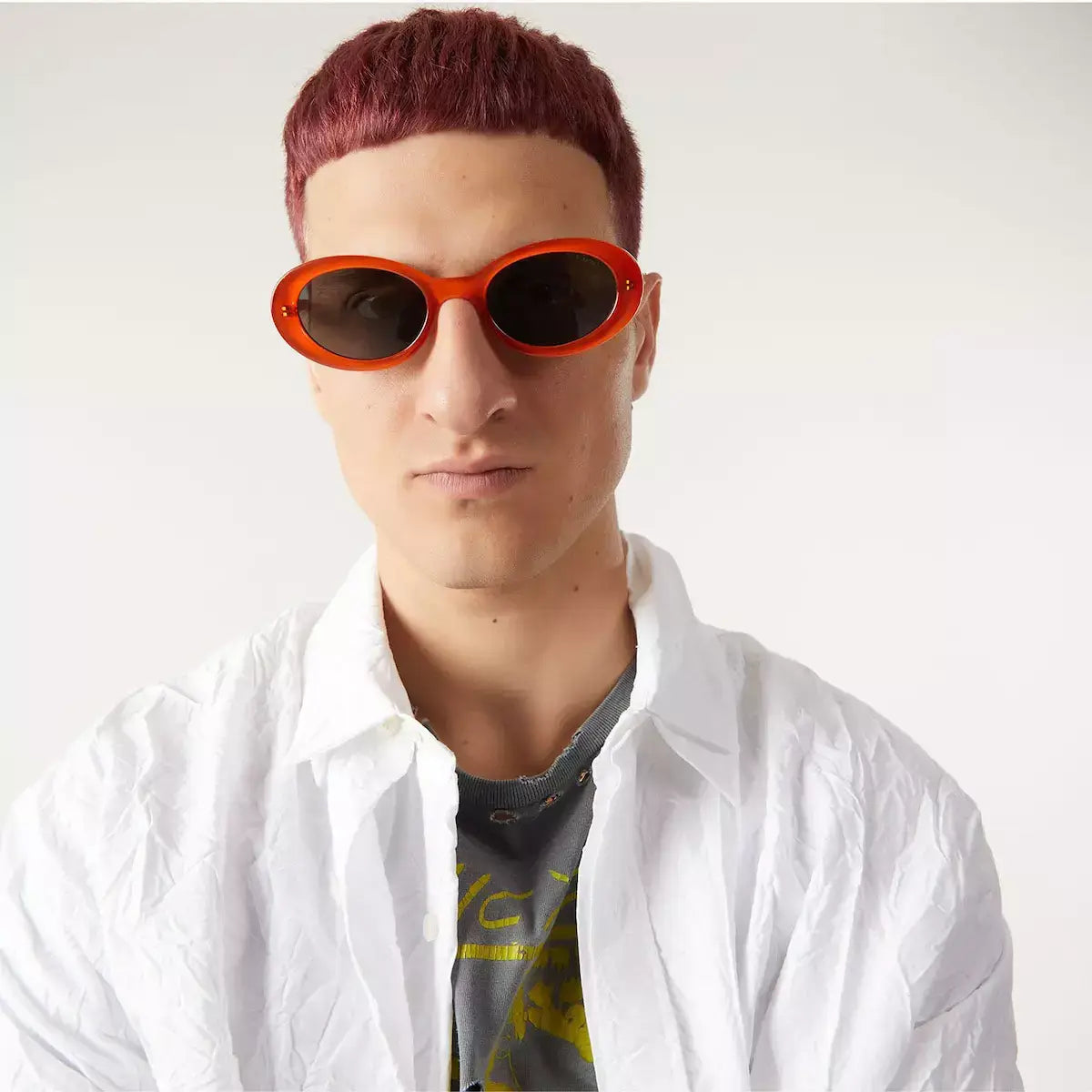 Ana Fox Sunglasses model showcasing unisex design with solid color lenses and eco-friendly bio nylon frame.