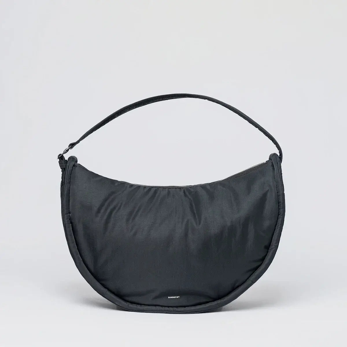 Curve Crossbody Round L Black Shoulder Bag with padded strap and magnetic buckle