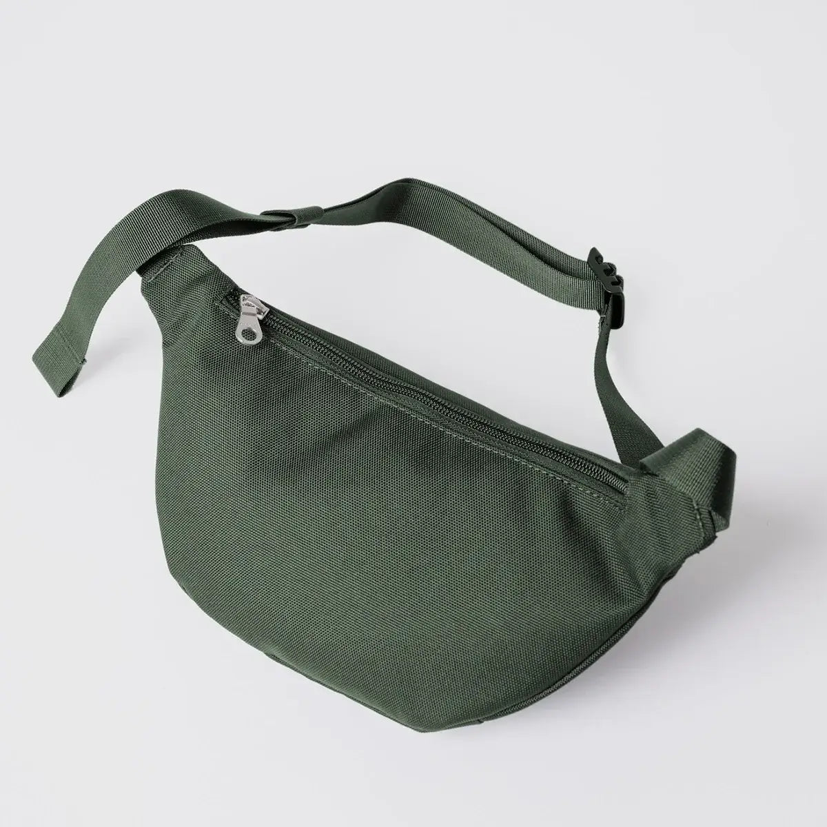 Ground Crossbody Bag Dawn Green Bum Bag in a stylish design with adjustable strap and extra zipped pocket.