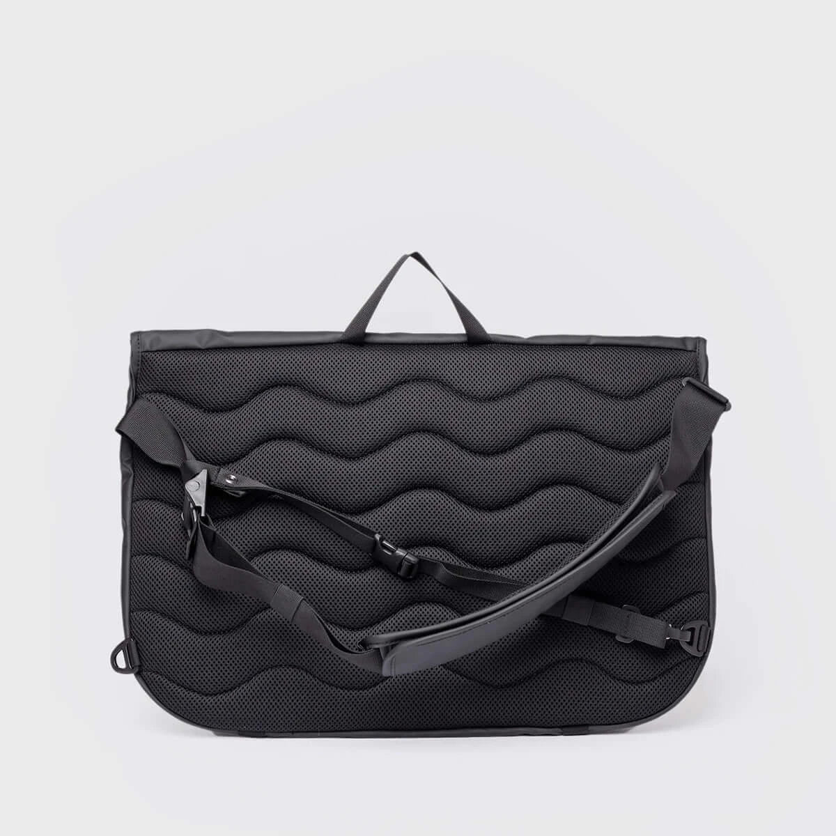 Stream Messenger Black Shoulder Bag with padded texture and adjustable strap, ideal for laptop carrying.