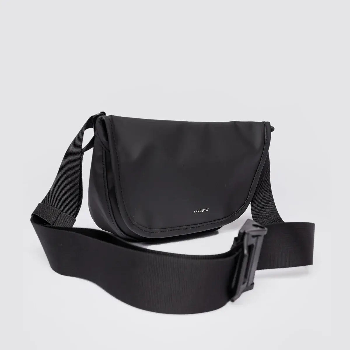 Stream Messenger Mini Black Shoulder Bag with adjustable strap and waterproof design.