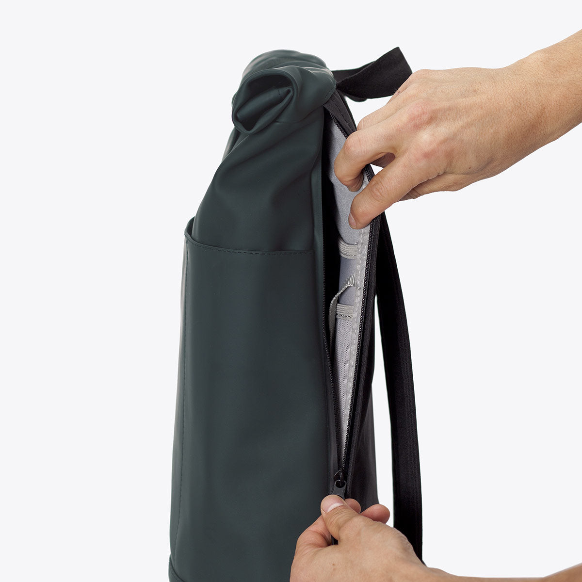 Hajo Lotus Forest Backpack showing side zipper for easy access and roll-top closure design.