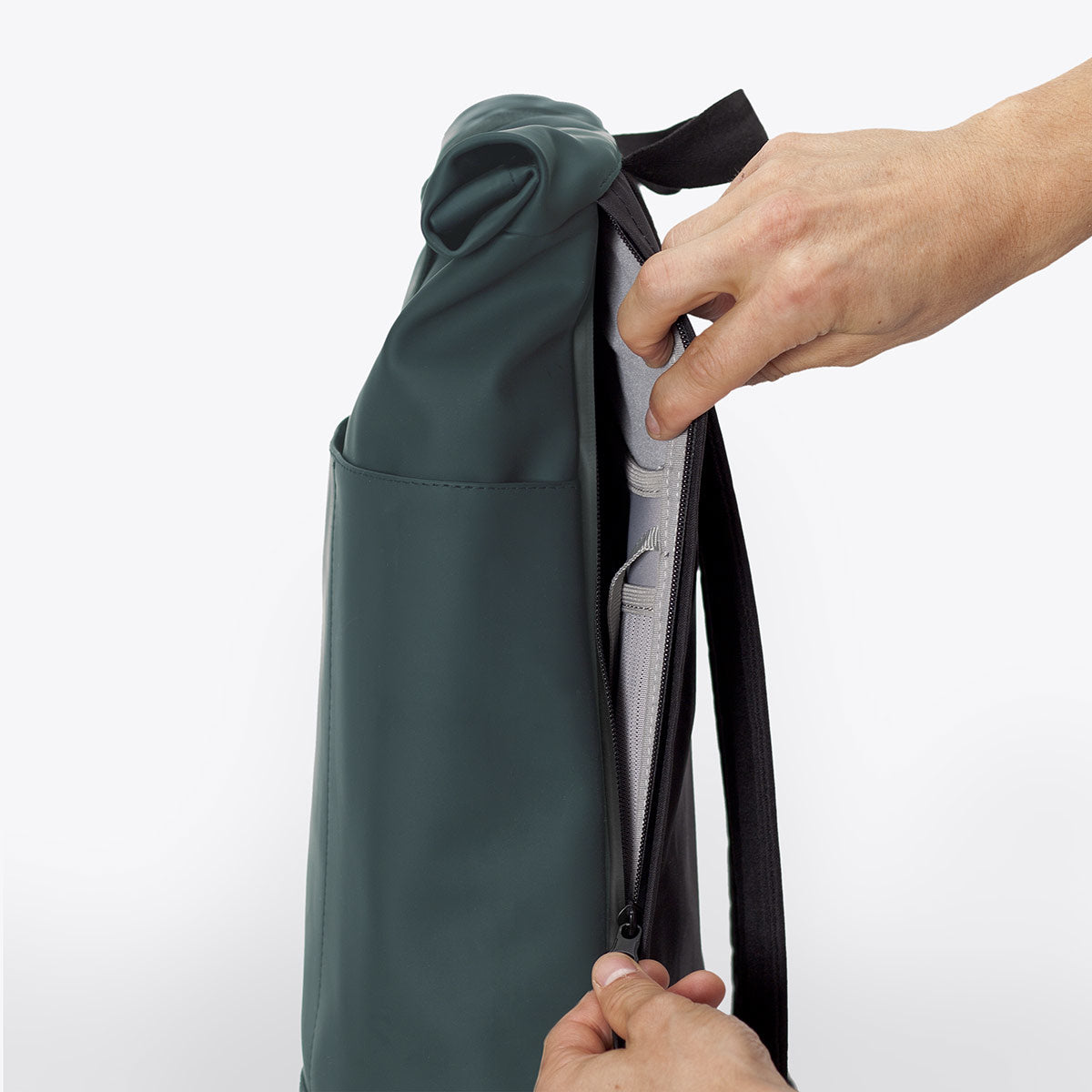 Hajo Mini Lotus Forest Backpack showing extra side zipper and roll-top closure for convenience.