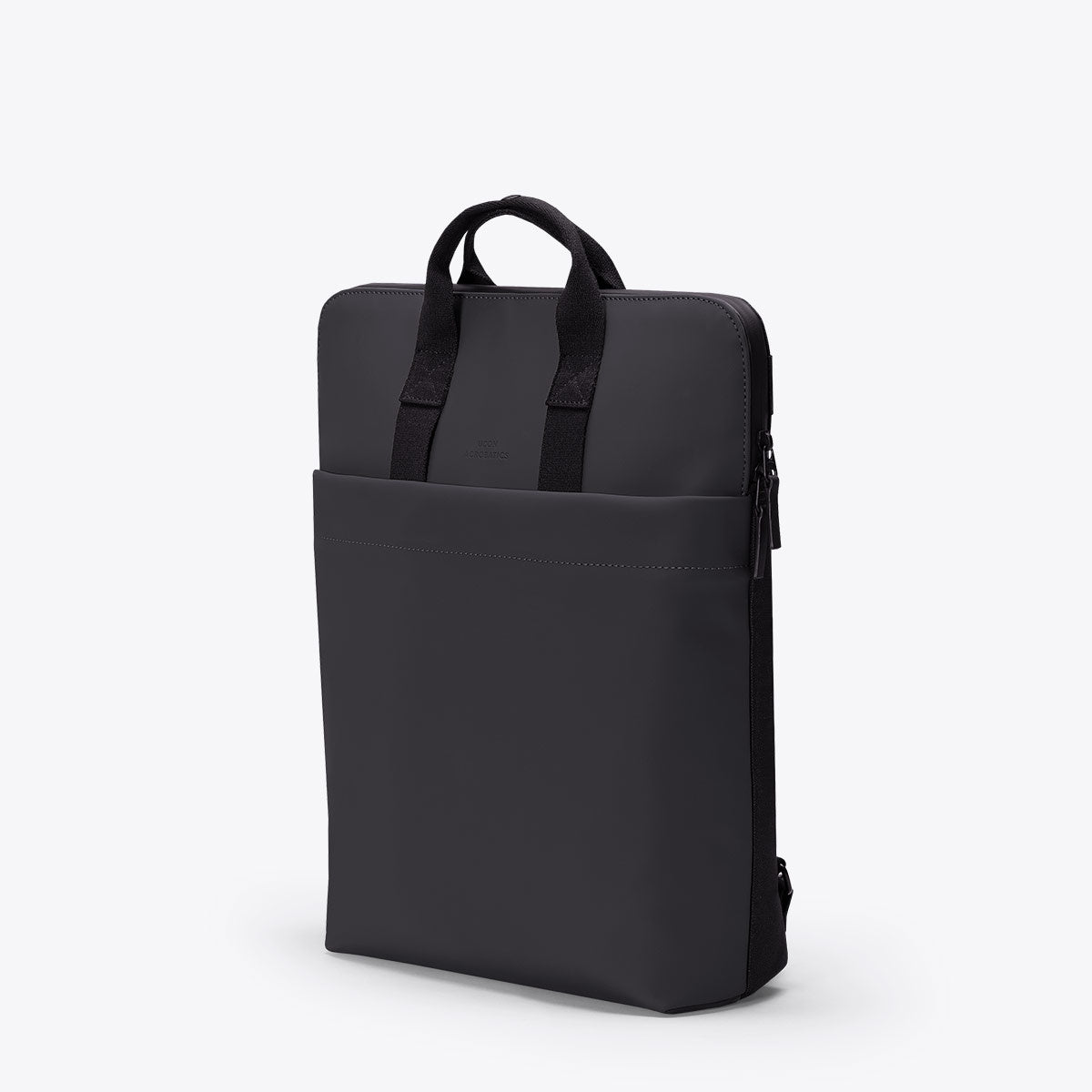 Masao Lotus Black Backpack with waterproof material and exterior pocket, featuring a minimalist design.