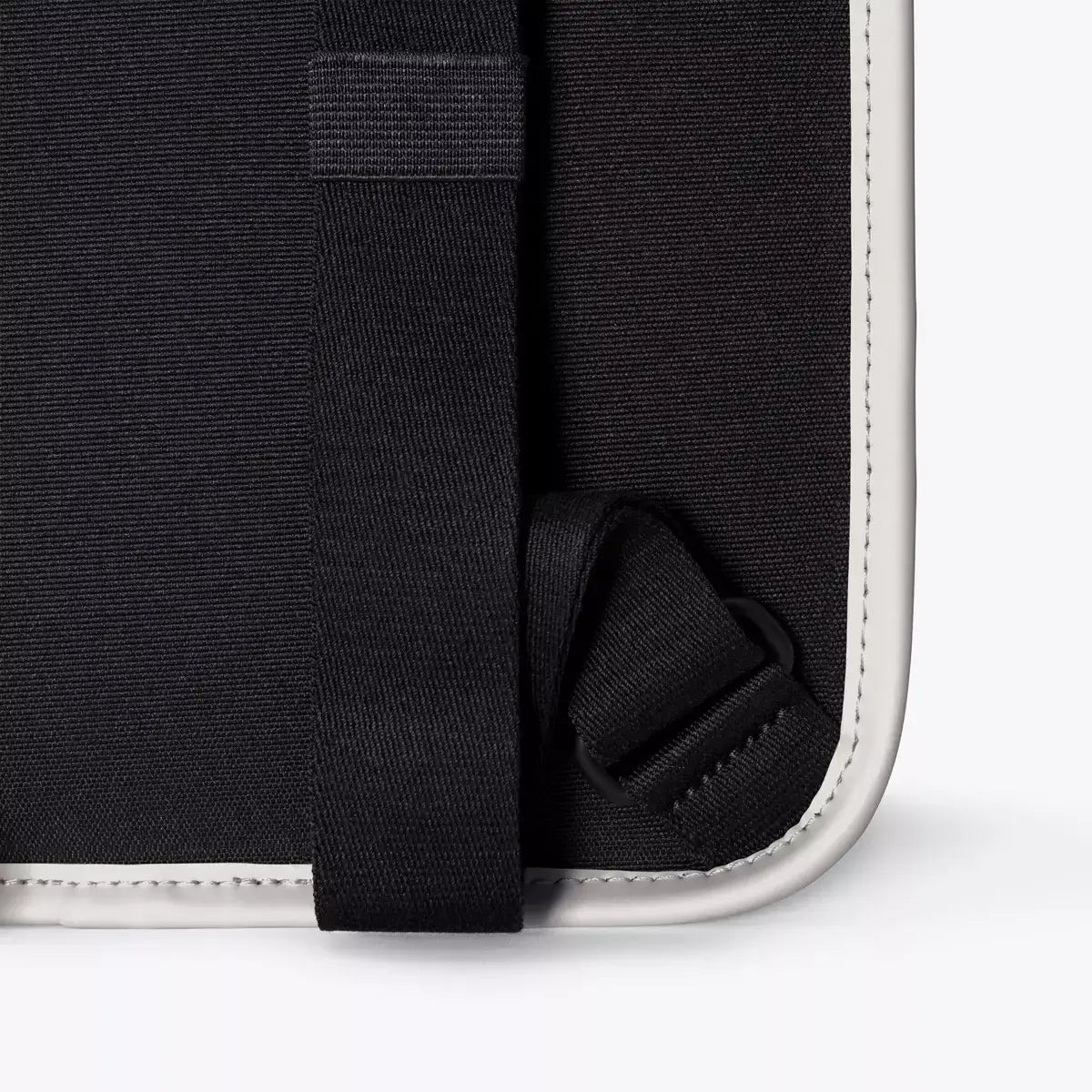 Detail of Adina Mini Lotus Infinity Glacier Grey Backpack fabric and strap design.