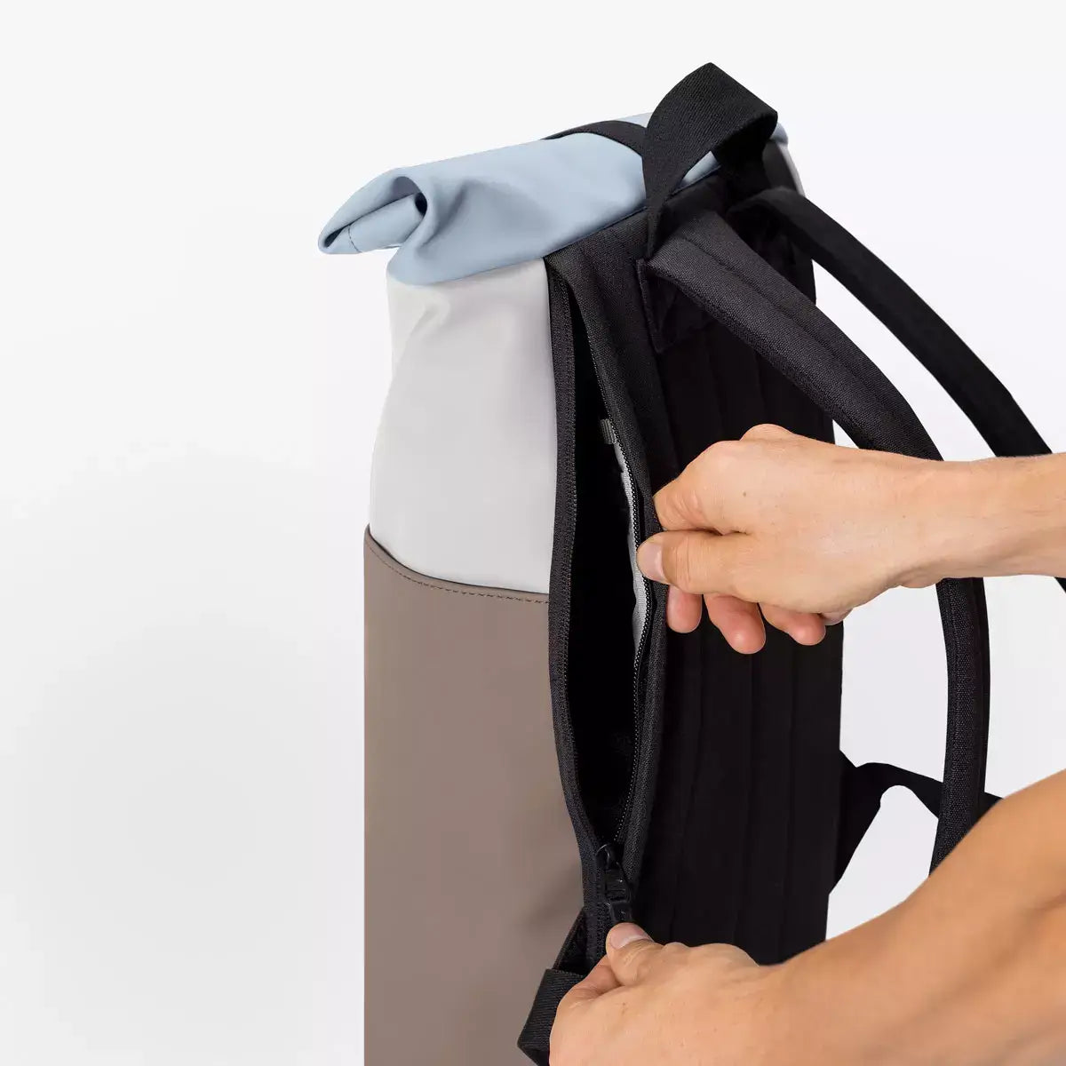 Hajo Lotus Infinity Glacier Grey Dark Sand Backpack side zipper and shoulder straps close-up image