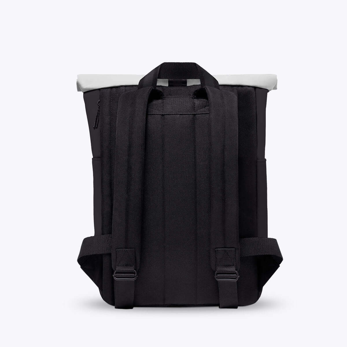 Hajo Mini Aloe Black Backpack featuring padded straps and roll-top closure, made from recycled materials.