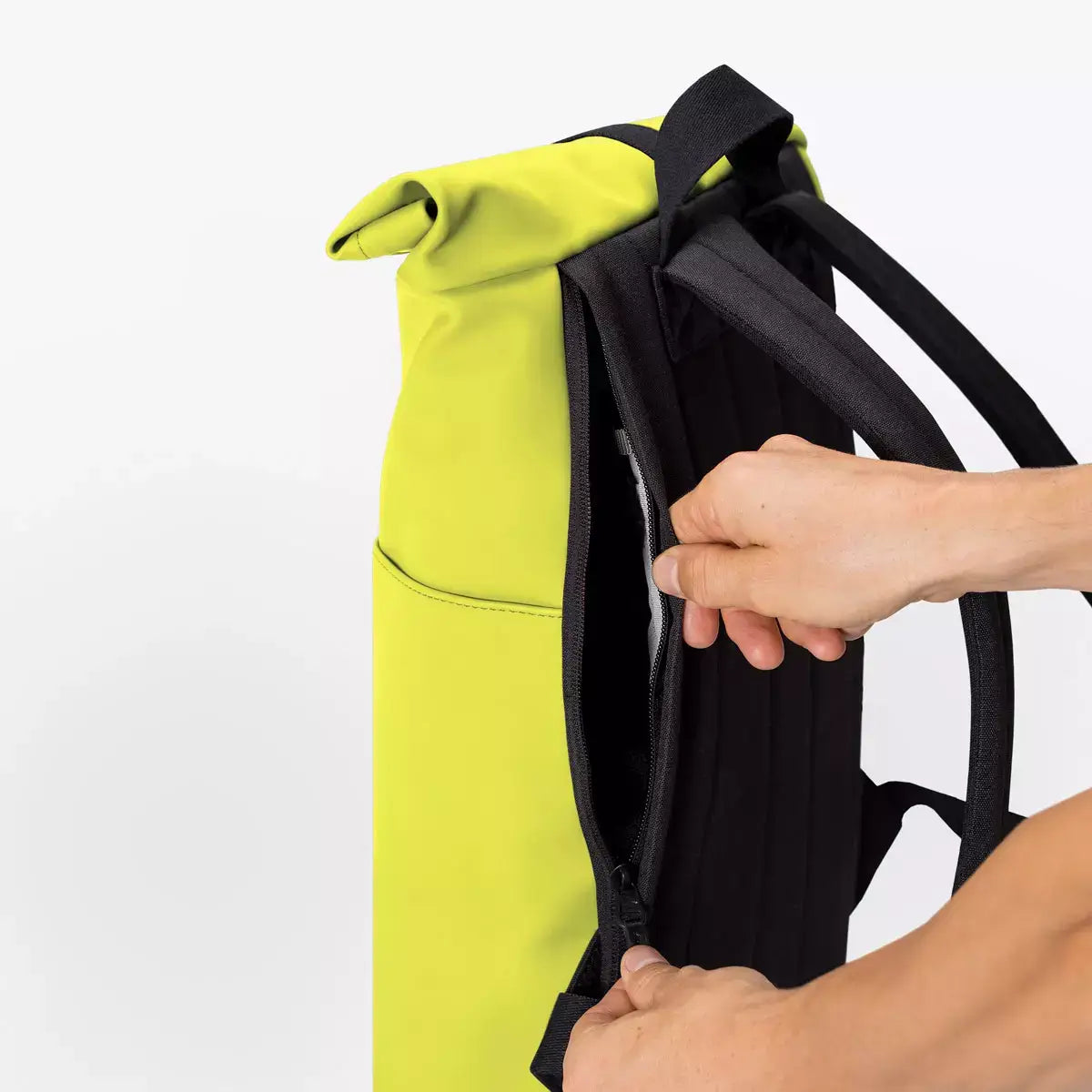 Hajo Mini Lotus Acid Lime Backpack with roll-top closure and side zipper for convenience.