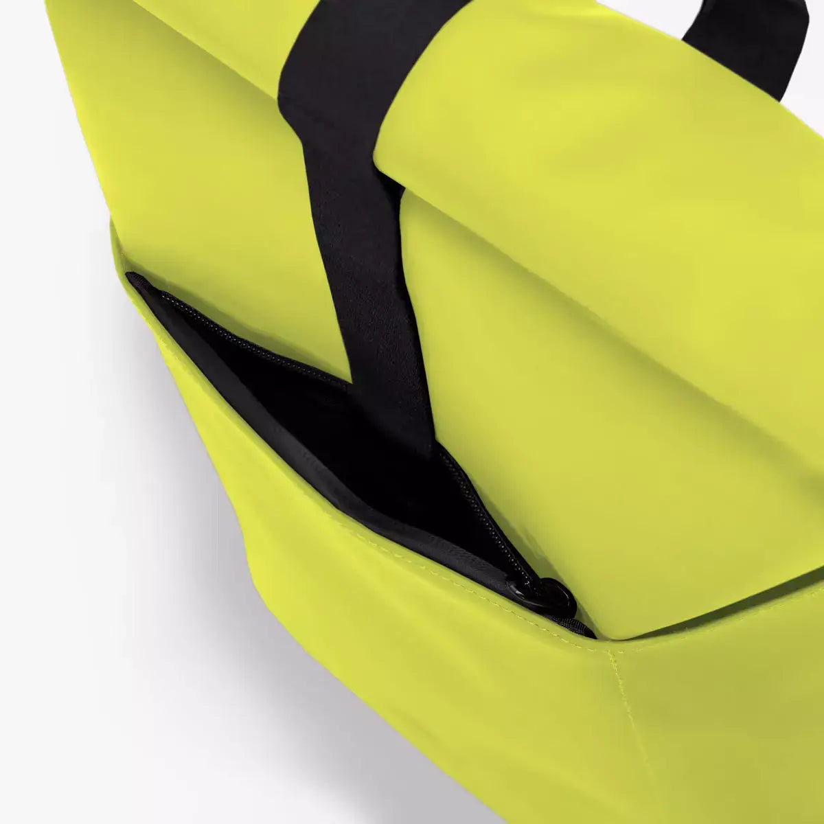 Hajo Mini Lotus Acid Lime Backpack showing roll-top closure and side zipper detail.