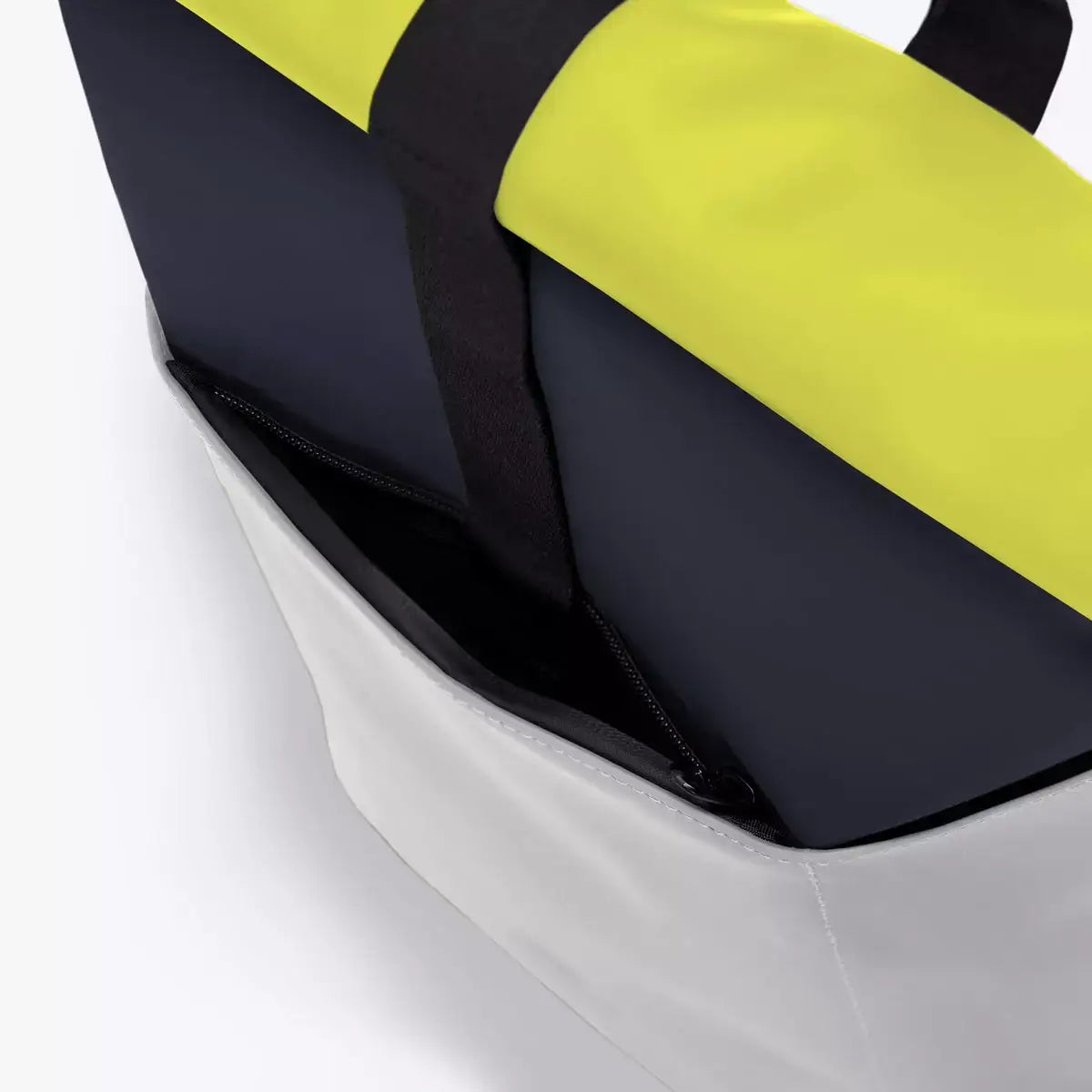 Hajo Mini Lotus Dark Navy Light Grey Backpack showing waterproof roll-top design and extra side zipper.