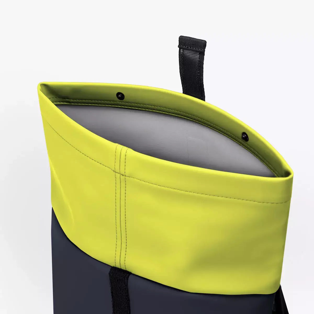 Hajo Mini Lotus Dark Navy Light Grey Backpack showing roll-top closure with velcro in vibrant yellow and grey interior.