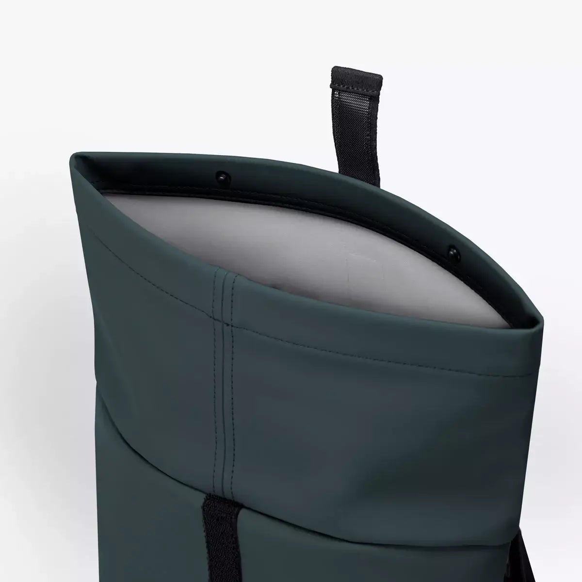 Hajo Mini Lotus Infinity Forest Backpack showing the top opening with durable material and padded interior.