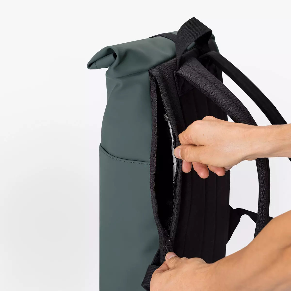 Hajo Mini Lotus Infinity Pine Green Backpack showcasing its durable material and side zipper.