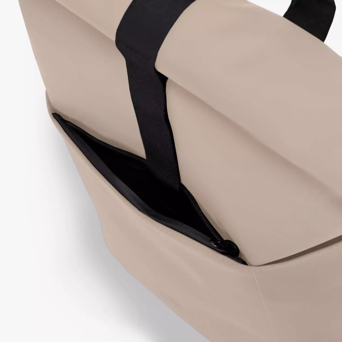 Close-up of the waterproof side zipper of the Hajo Mini Lotus Infinity Sand Backpack.