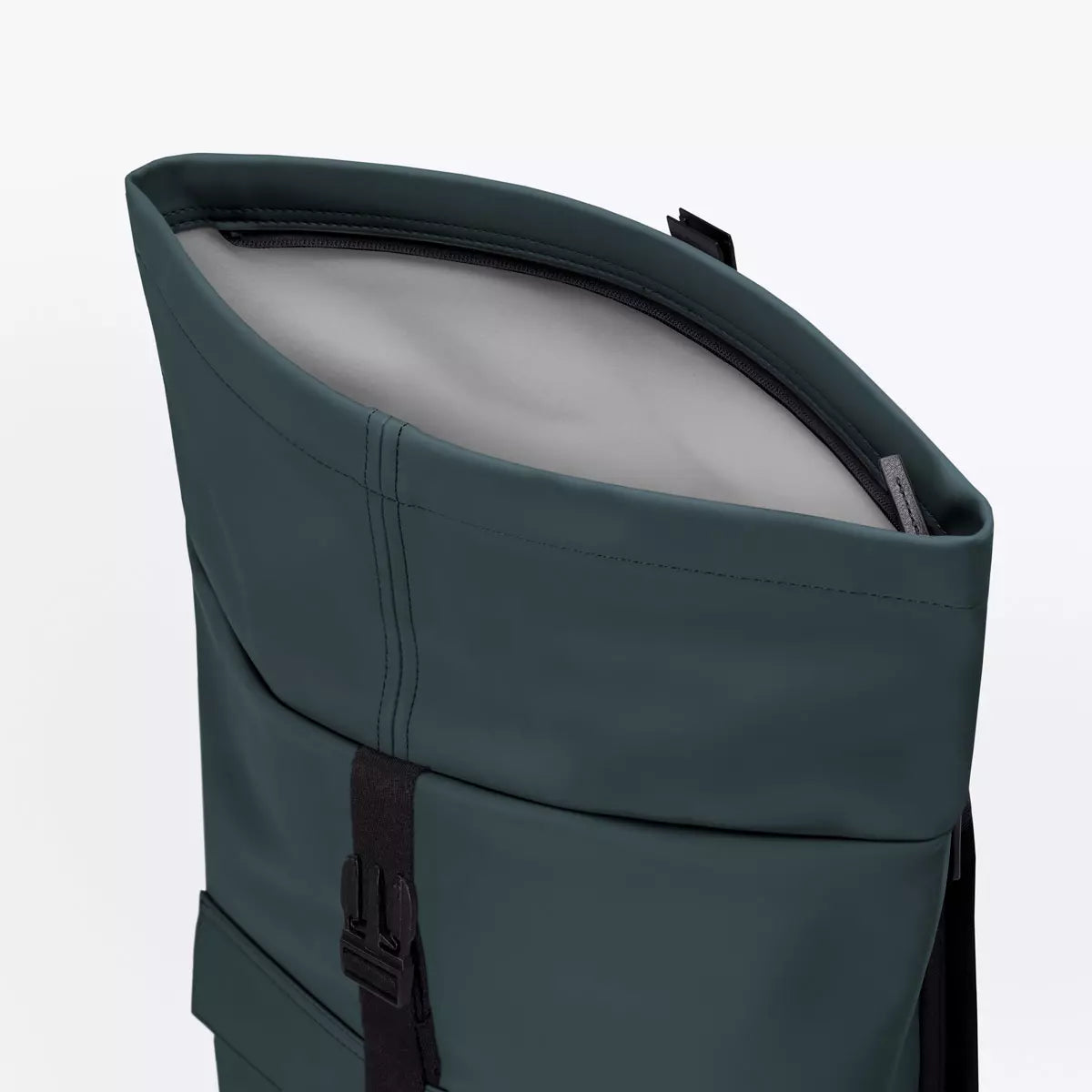 Jannik Mini Lotus Infinity Forest Backpack roll-top closure showcasing durable waterproof material.