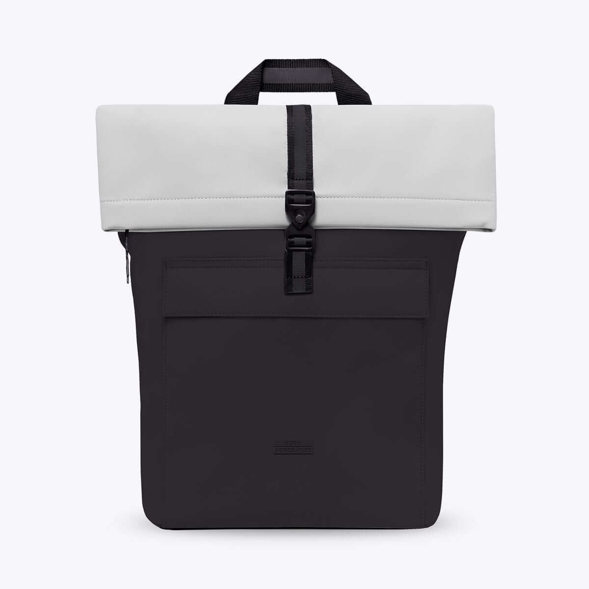 Jasper Aloe Black Backpack featuring a roll-top closure, side zipper, and waterproof design.