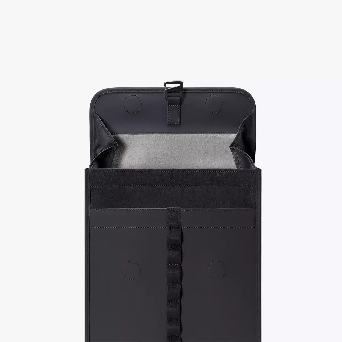 Kumo Medium Lotus Infinity Black Backpack open zipper view showcasing interior compartments and waterproof material.