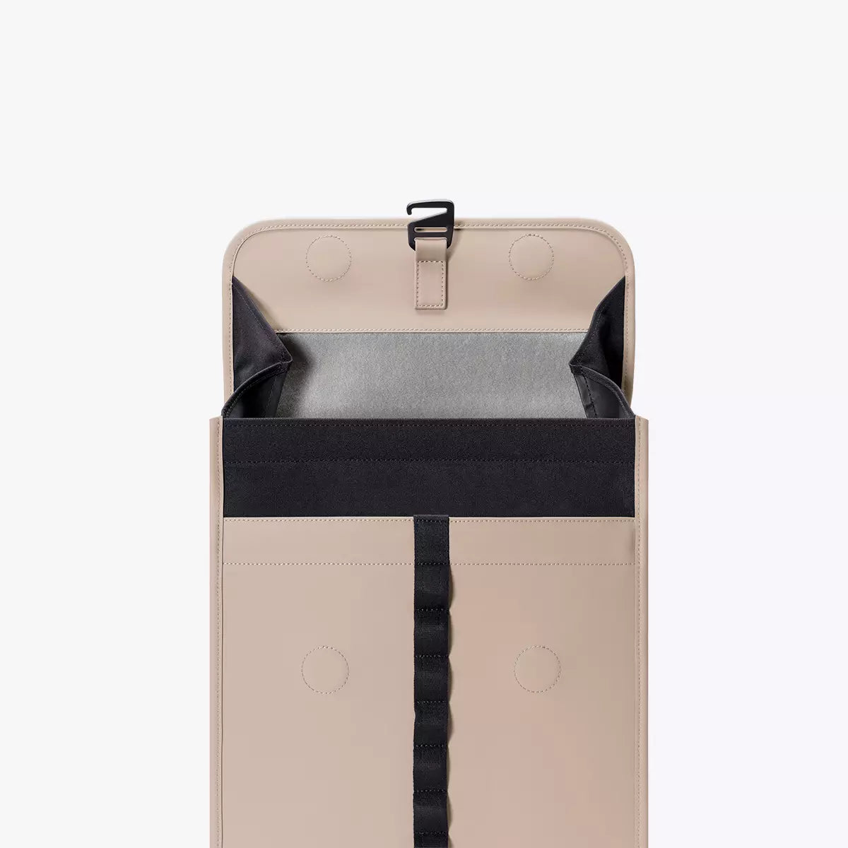 Interior view of the Kumo Medium Lotus Infinity Sand Backpack showcasing the opening and storage compartments.