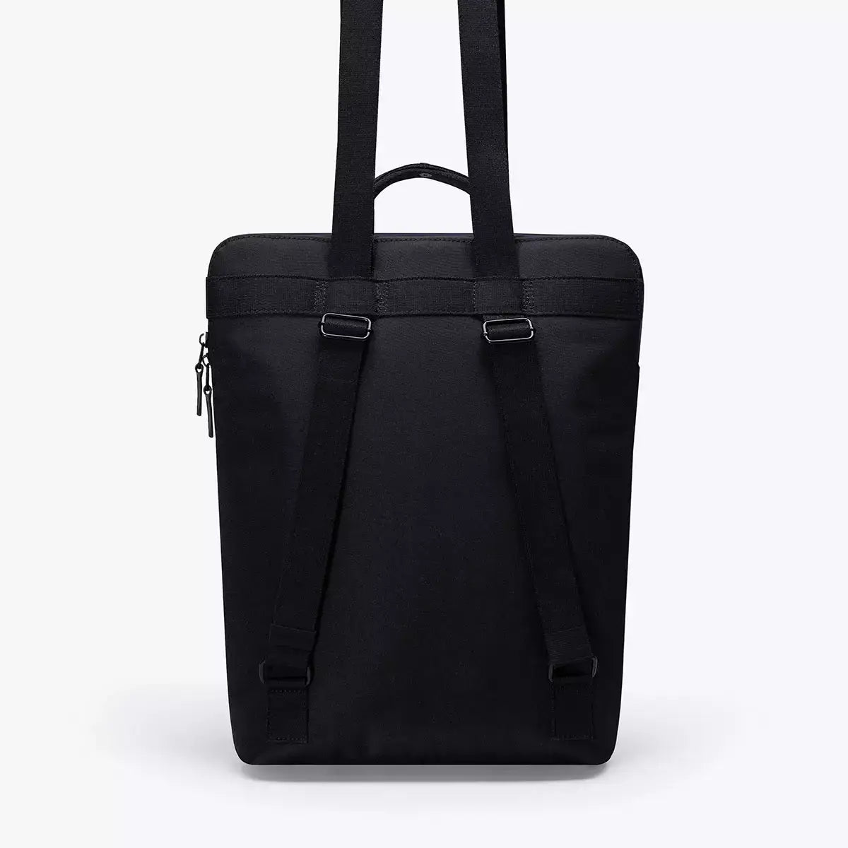 Masao Lotus Dark Navy Backpack featuring a sleek black design with durable straps and zipper closure.