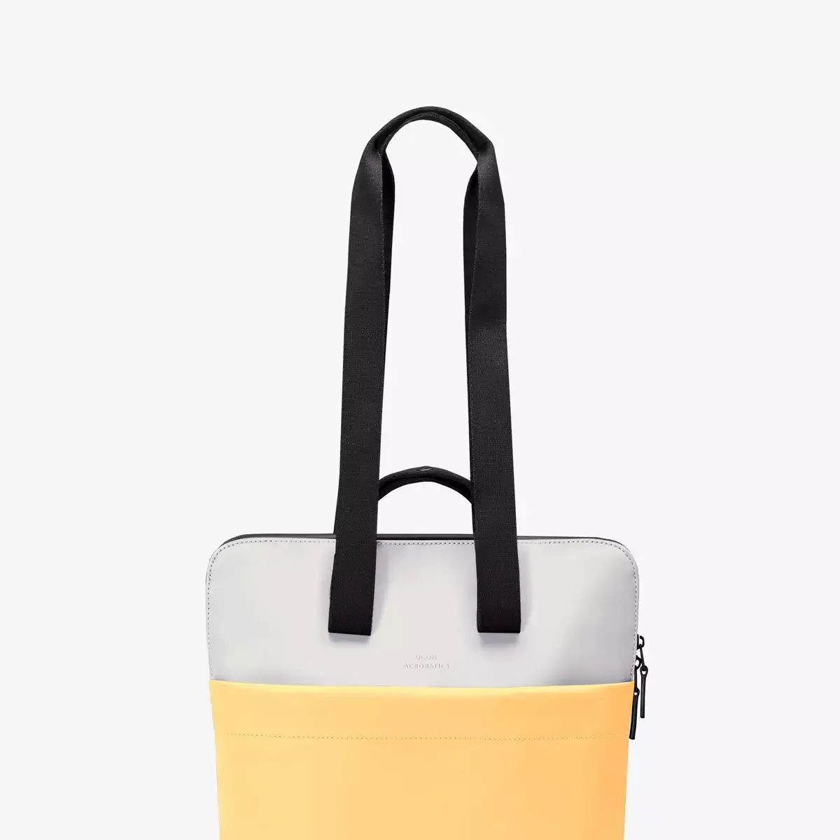 Masao Lotus Infinity Glacier Grey Lemon Backpack with yellow pocket and grey top, stylish and functional.