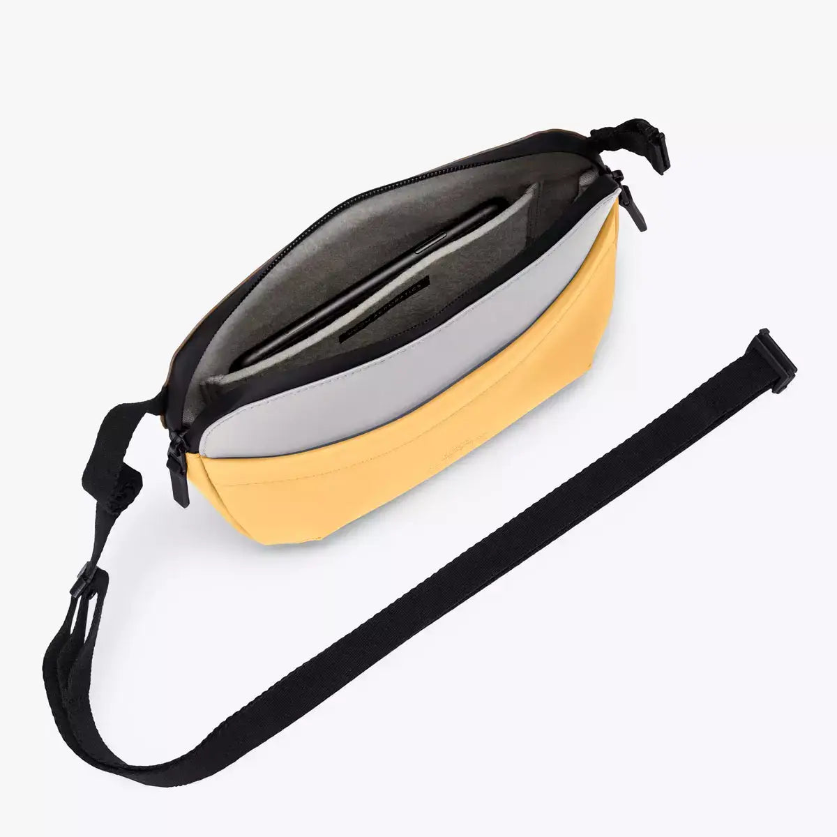 Melvin Medium Lotus Infinity Glacier Grey Lemon Bum Bag with durable design and adjustable strap, open view showing pockets.