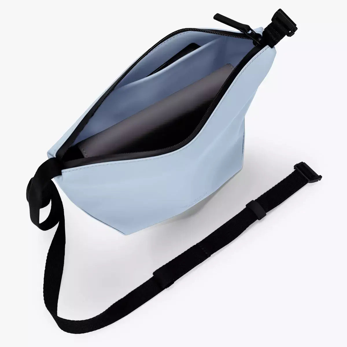 Nola Lotus Fog Blue Shoulder Bag open showing interior pocket and adjustable strap