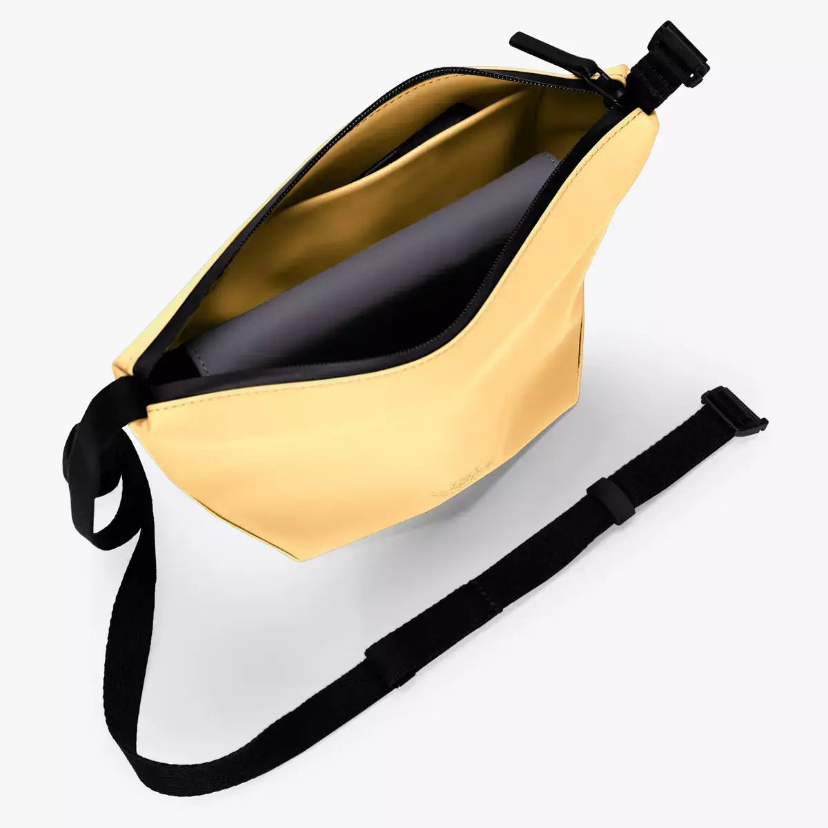 Nola Lotus Infinity Lemon Shoulder Bag showcasing its waterproof design and spacious interior pockets.