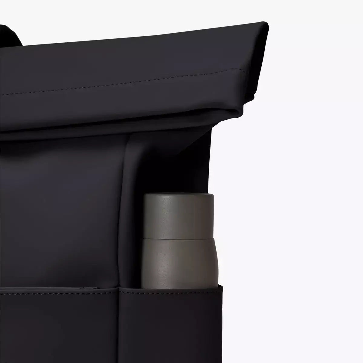 Yuto Medium Lotus Infinity Black Backpack side pocket with water bottle