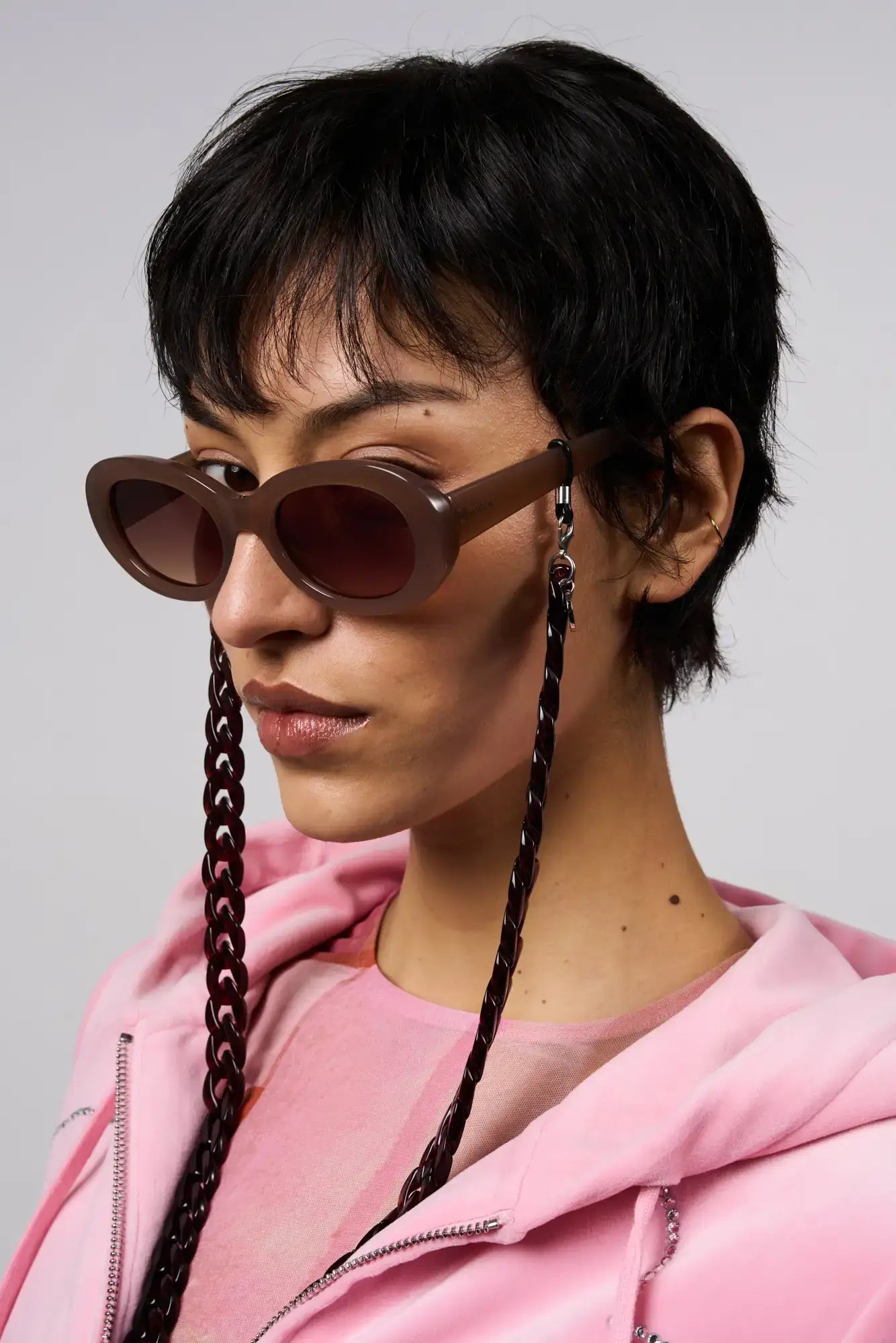 Luna Sahara Sunglasses displayed on a model, showcasing a stylish design with UV protection.