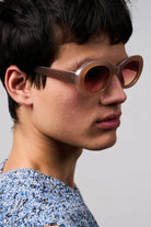 Luna Sahara Sunglasses worn by a model showcasing their stylish design and premium UV protection.