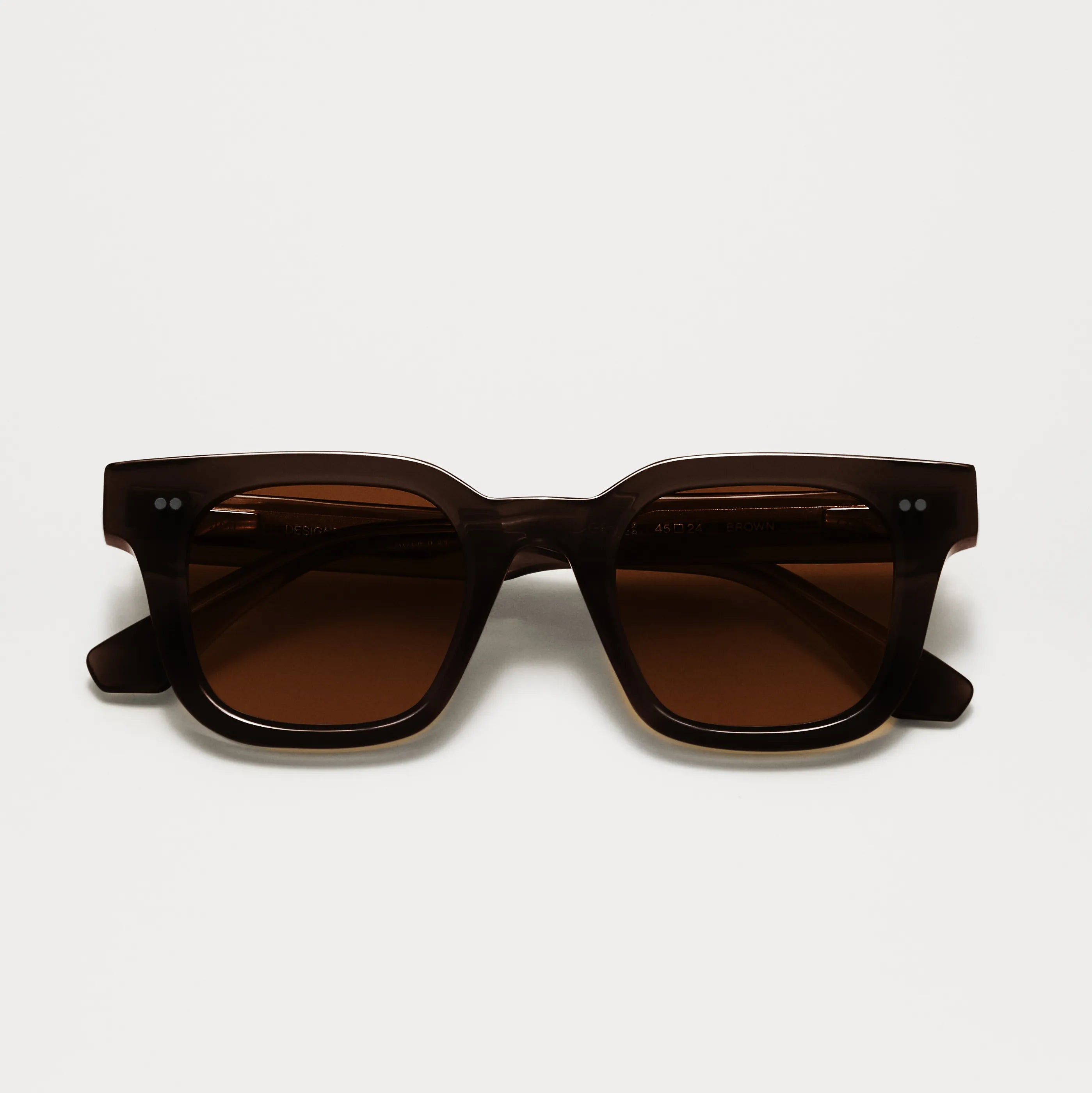 04 Core Brown Sunglasses front view with brown lenses and durable frame for unisex style.