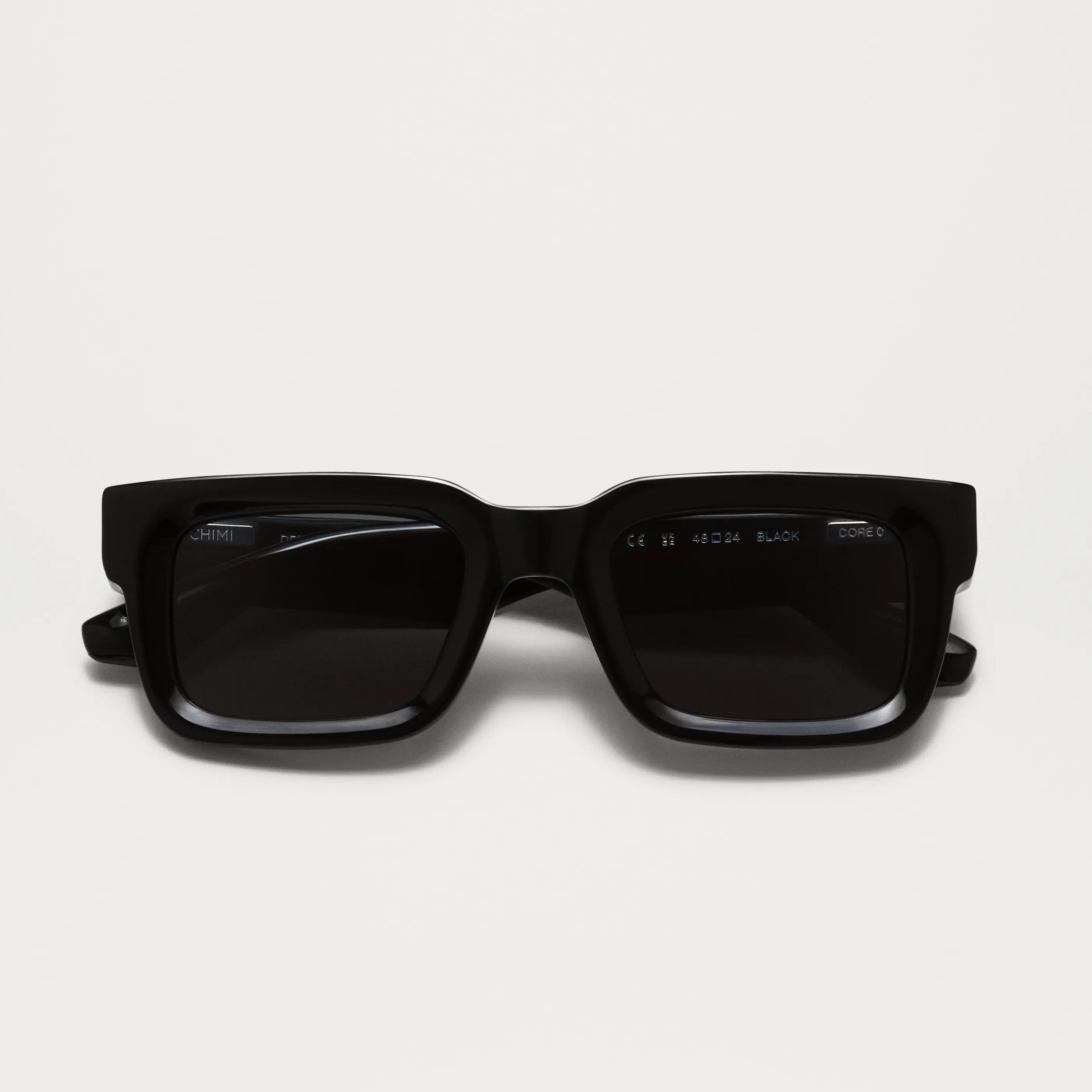 05 Core Black Sunglasses front view with dark lenses and durable frame, ideal for medium to large heads.