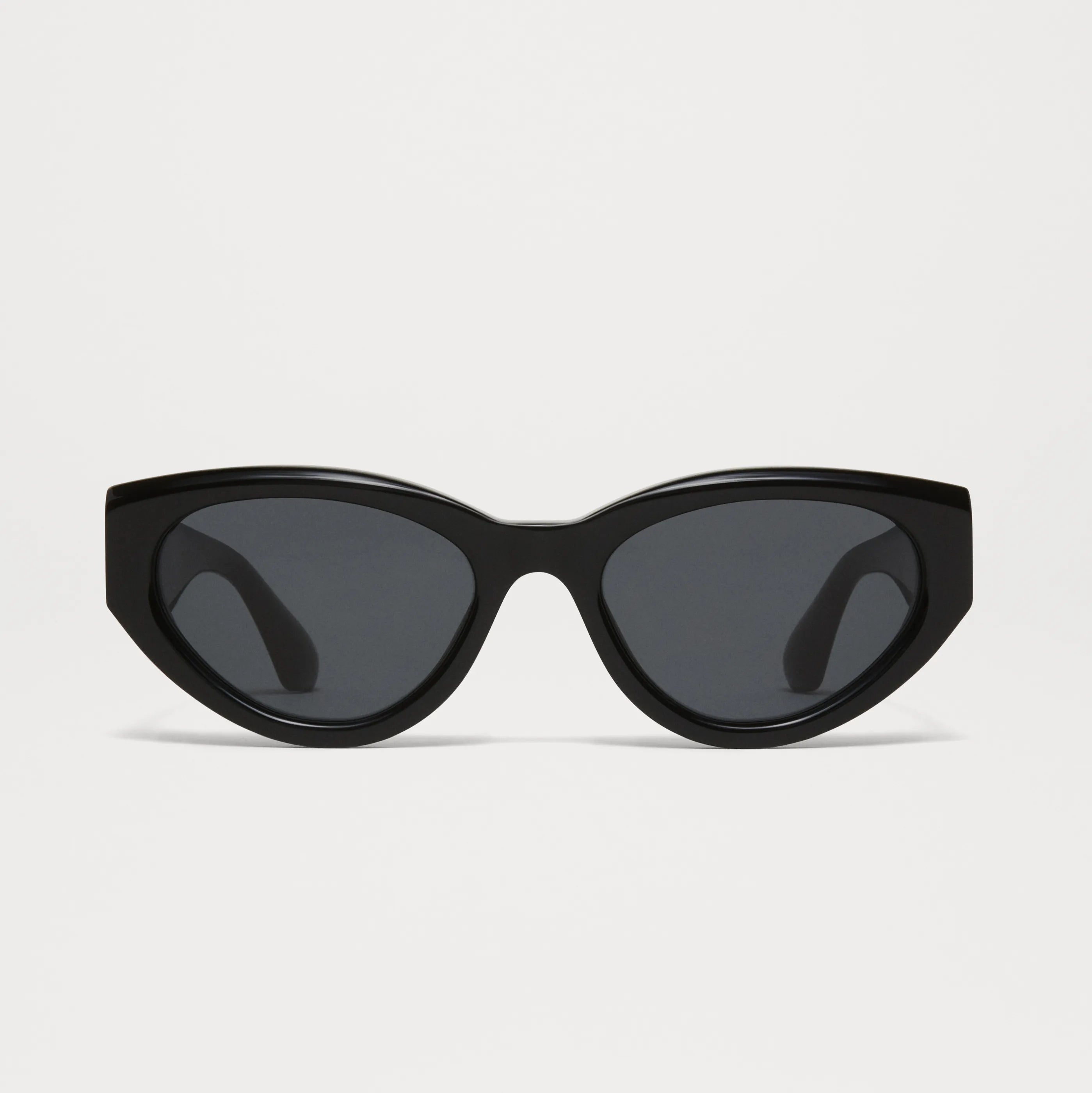 06 Core Black Sunglasses featuring durable Acetate Renew™ with 100% UVA + UVB protection and anti-scratch lenses.