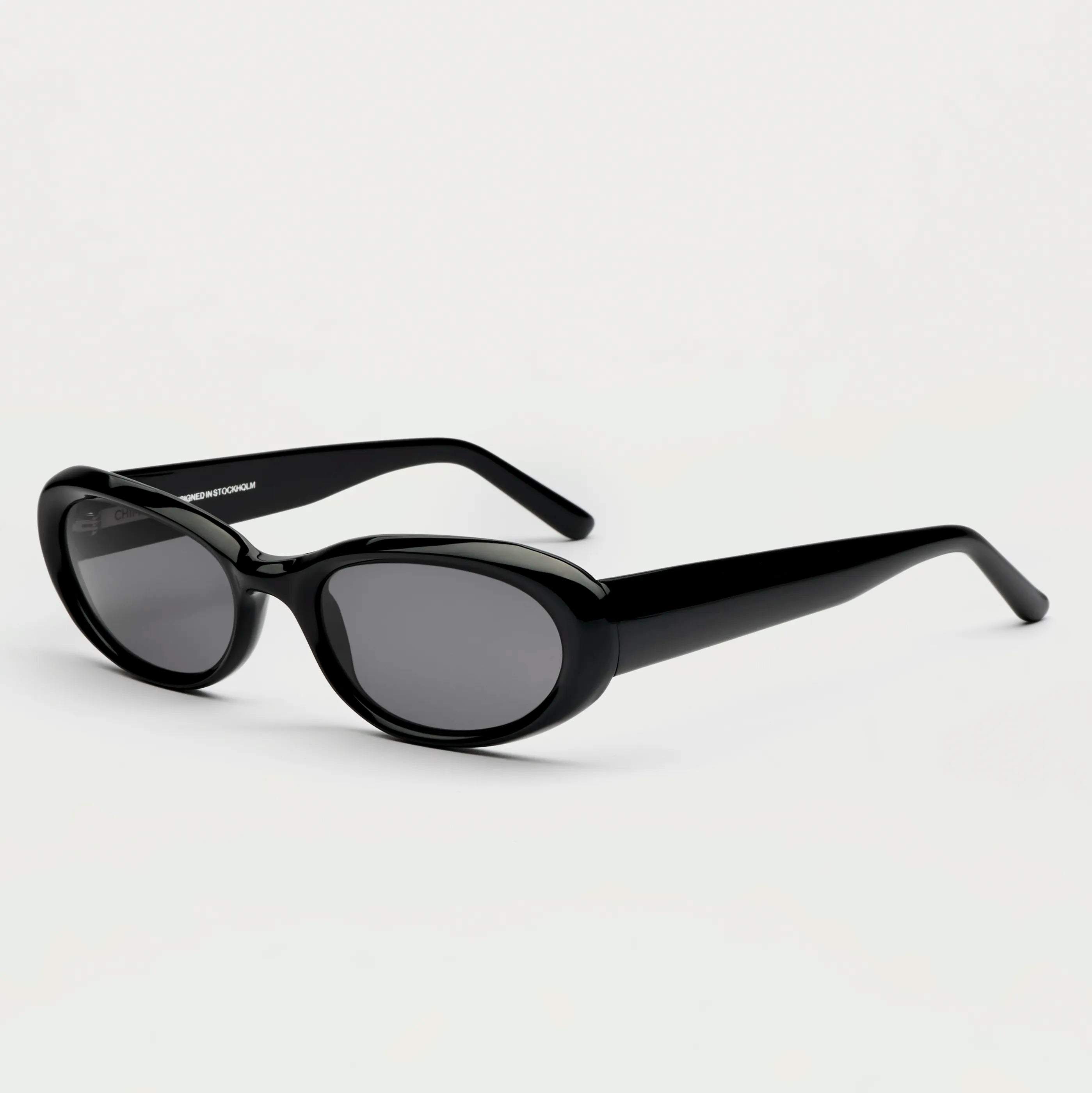 09 Core Black Sunglasses showcasing stylish design with anti-scratch lenses and durable Acetate material.