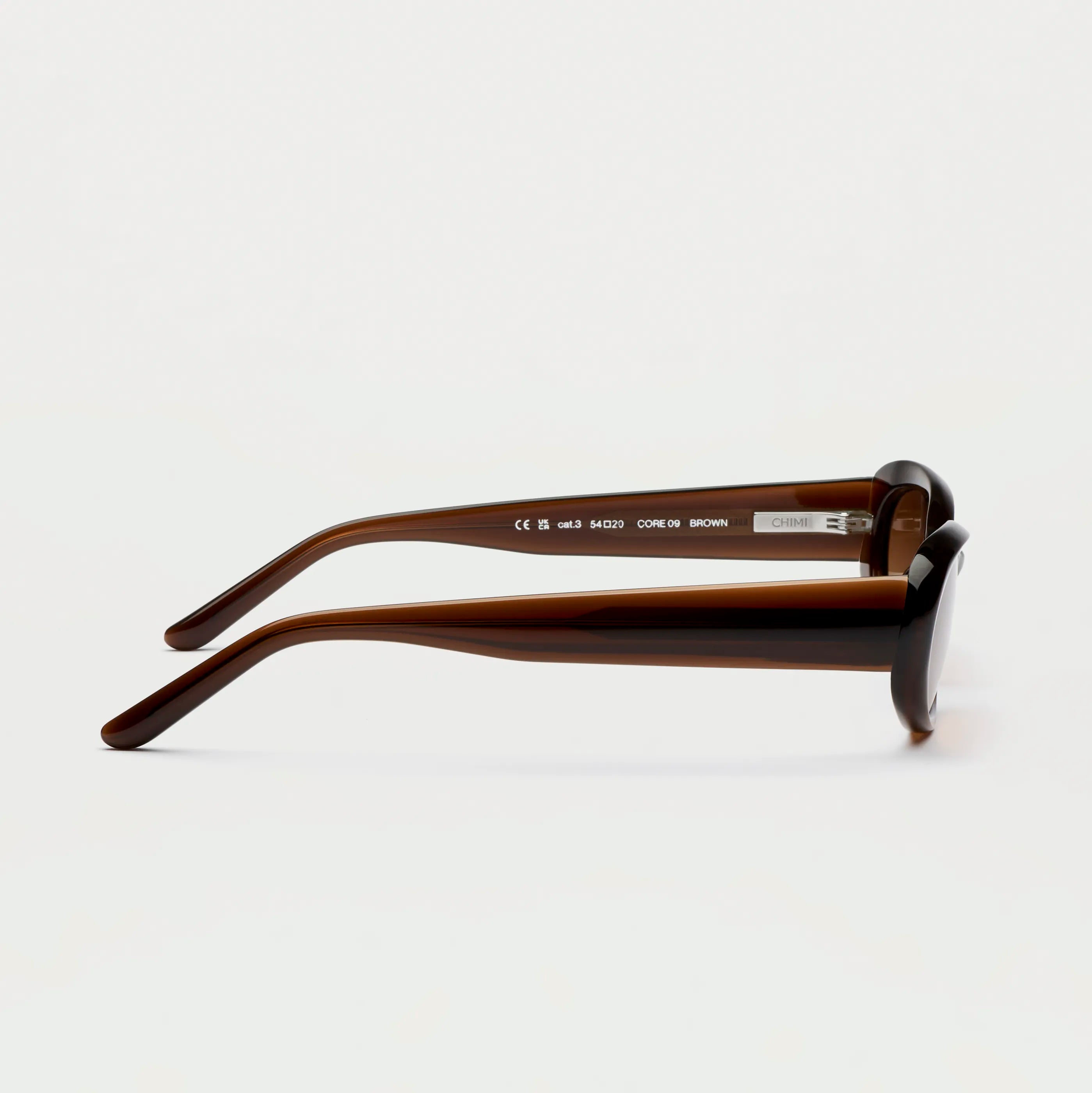 Side view of 09 Core Brown Sunglasses showcasing durable Acetate material and stylish design.