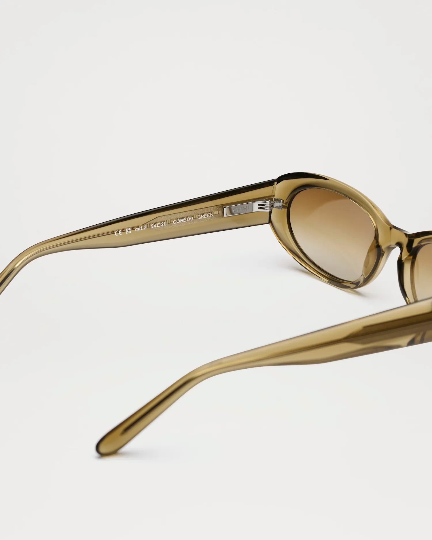 09 Core Green Sunglasses with anti-scratch lenses and durable Acetate Renew™, ideal for UV protection.