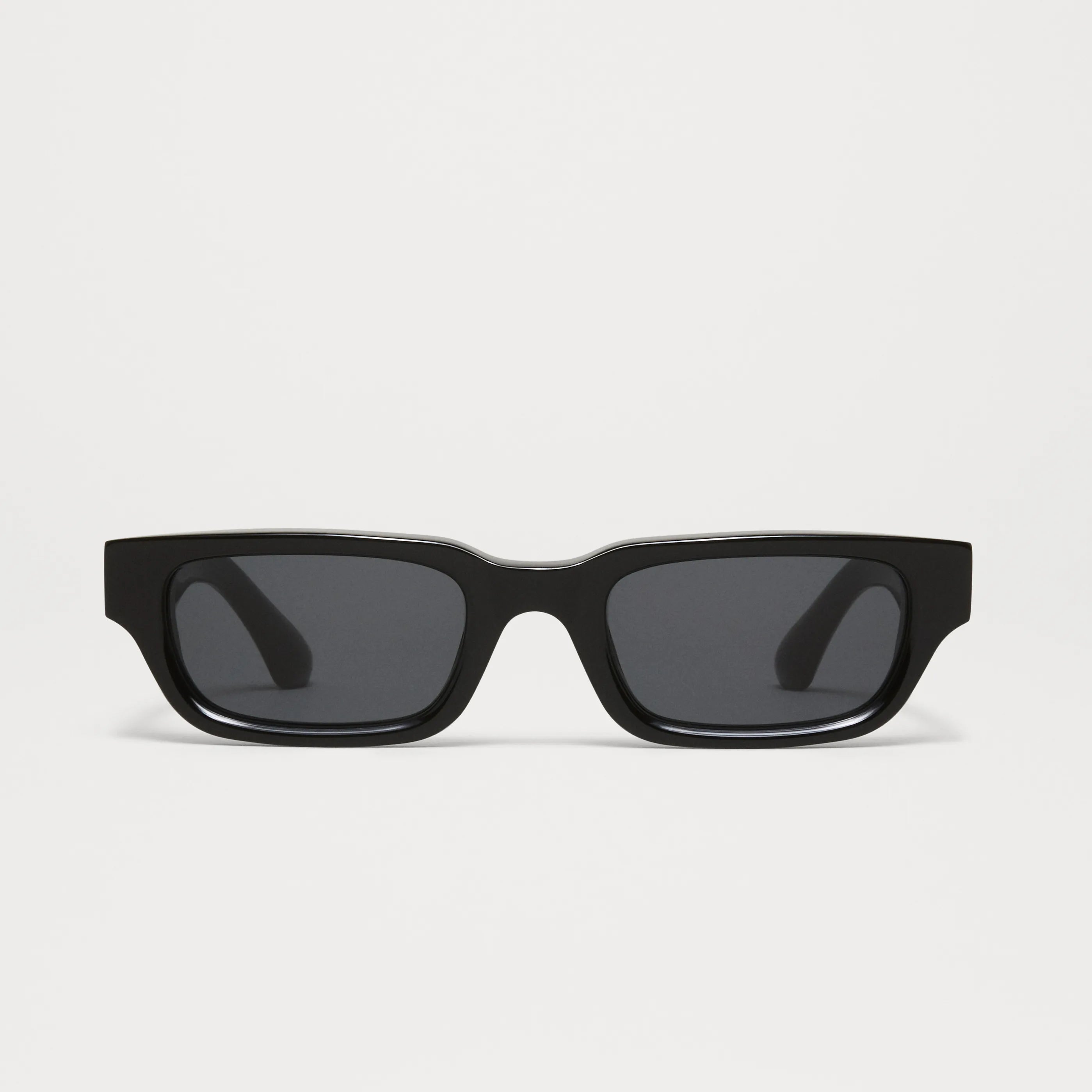 10 Core Black Sunglasses front view with dark lenses, designed for unisex, featuring durable Acetate Renew material.