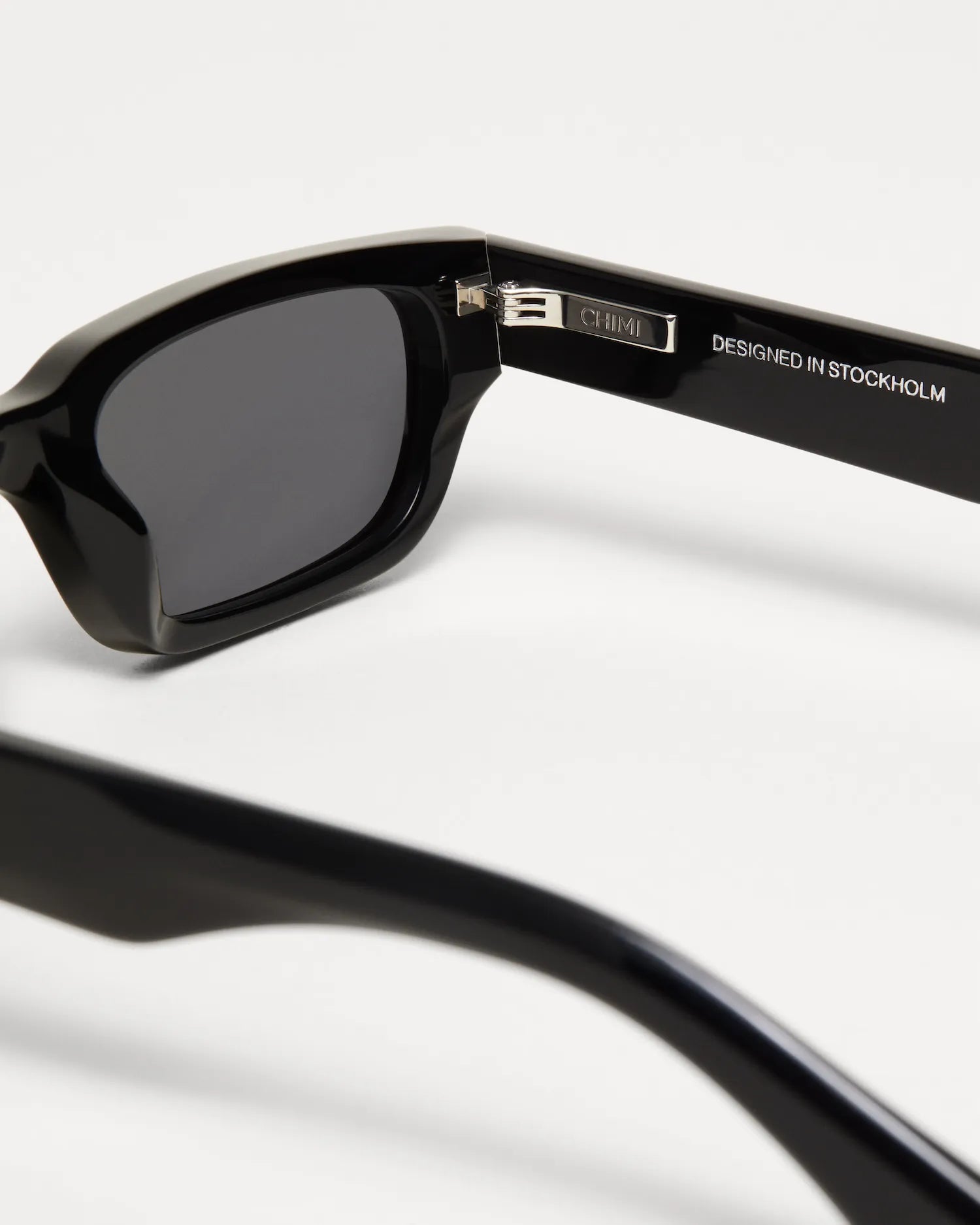 10 Core Black Sunglasses with anti-scratch lenses and adjustable Acetate frame, designed in Stockholm.