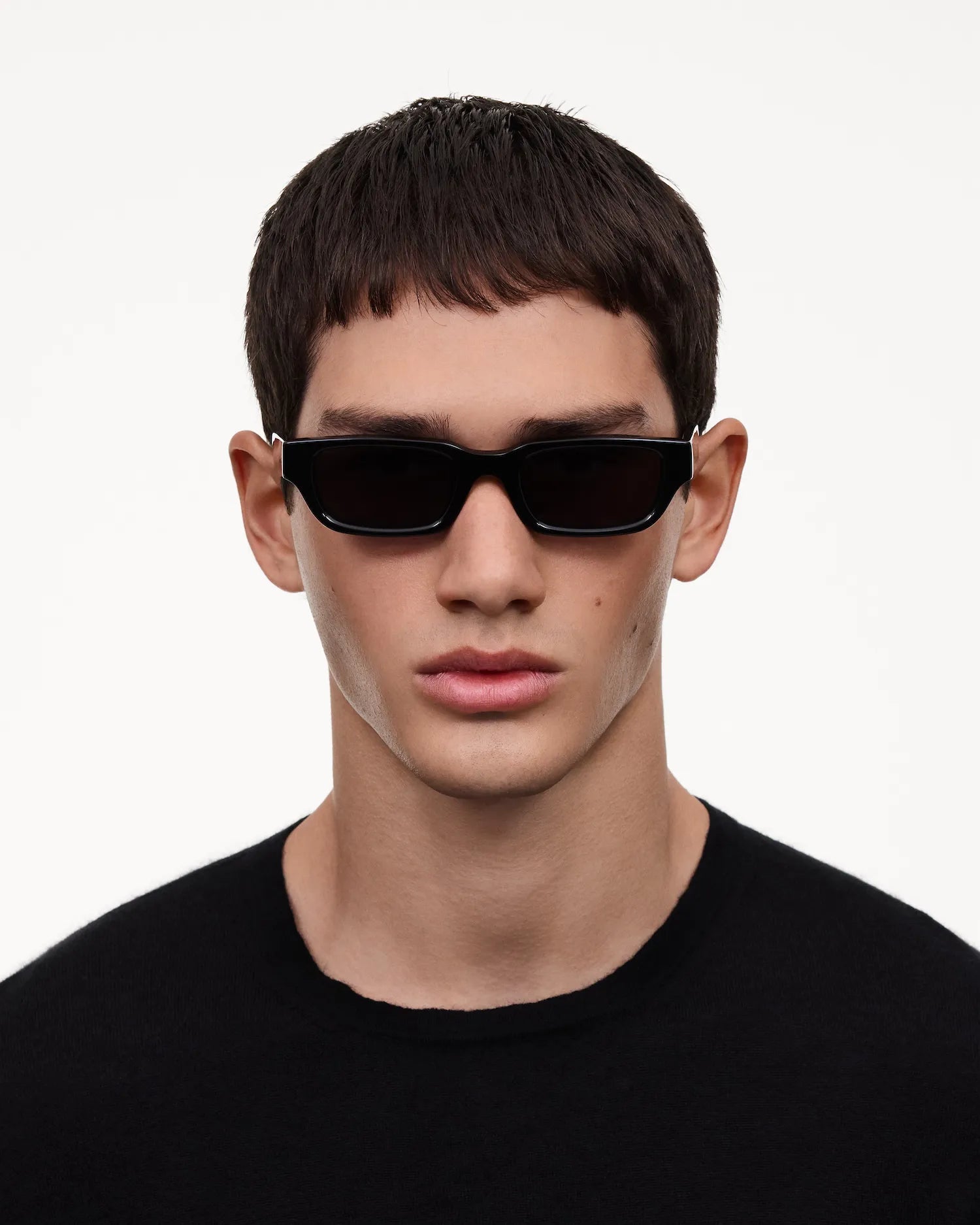 10 Core Black Sunglasses on a model, showcasing stylish design and UV protection.