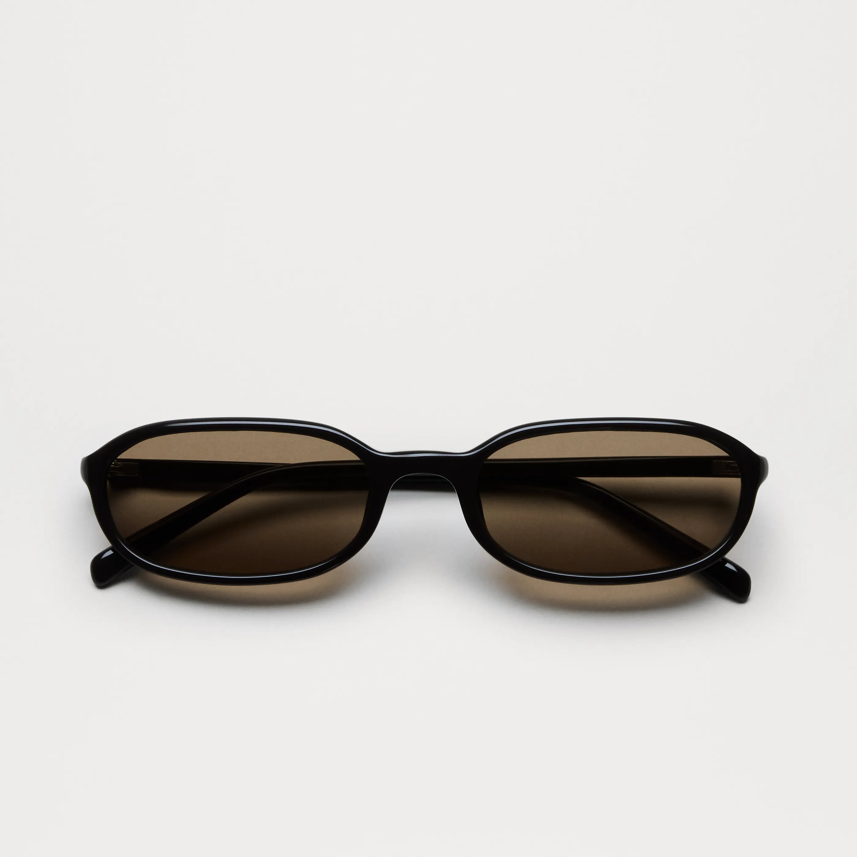 Edith Dark Brown Sunglasses with anti-scratch lenses and durable Acetate material, ideal for small to medium heads.