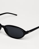 Ellipse Black Sunglasses showcasing stylish design and durable materials with anti-scratch lenses.