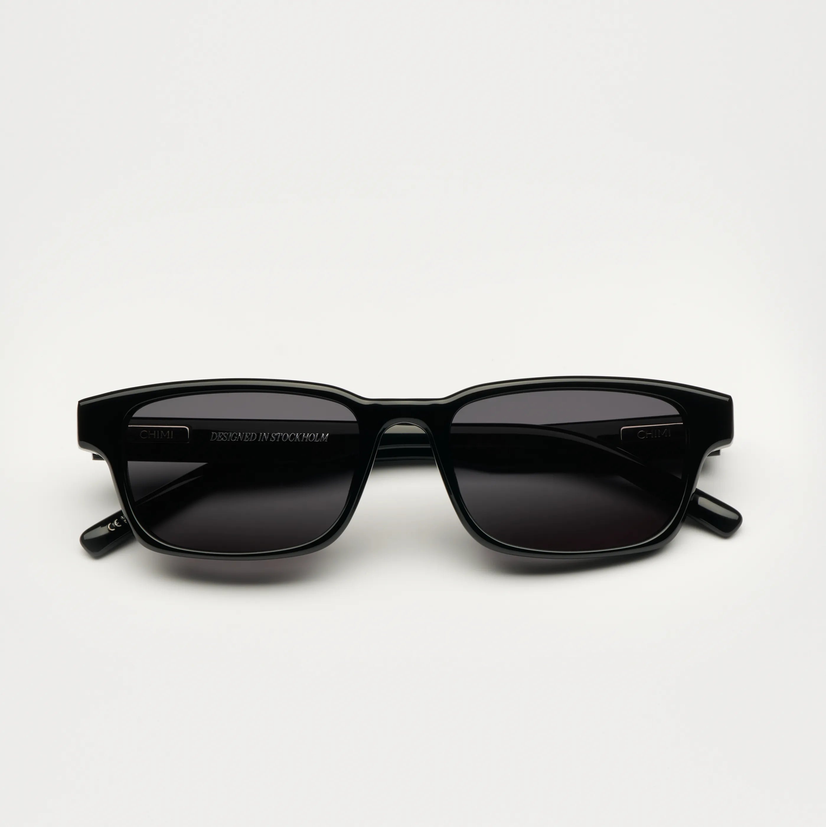 Kasi Black Sunglasses with anti-scratch lenses and durable Acetate, designed in Sweden, featuring UV protection.