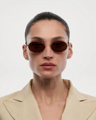 Lea Royal Tortoise Sunglasses worn by a model, showcasing stylish design and quality craftsmanship.
